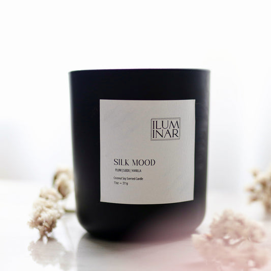 luxury coconut soy candle with wooden wick in a high quality glass matte black vessel